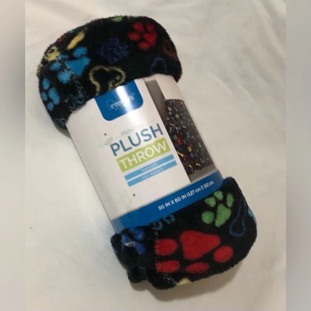 Black Plush Blanket Roll with Multicolor dog bones and Paw Print Pattern. 50X60